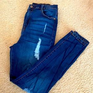 Skinny dark wash ripped jeans